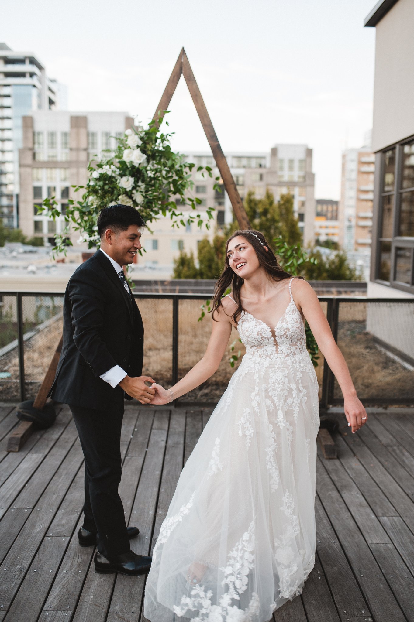 Wedding couple sharing a joyful moment, showcasing their happiness on their special day